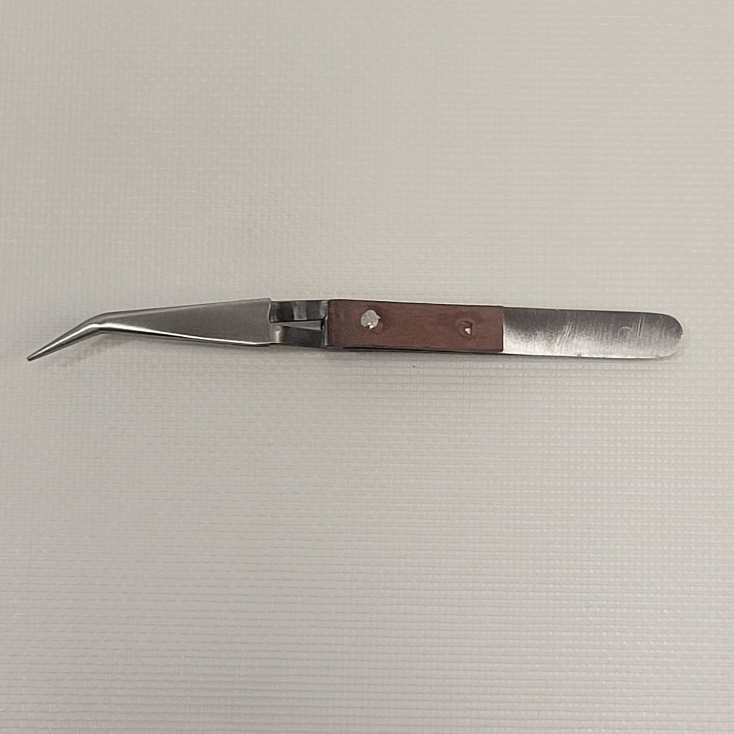 4 5/8" Reverse Clamp Tweezers with Bent End