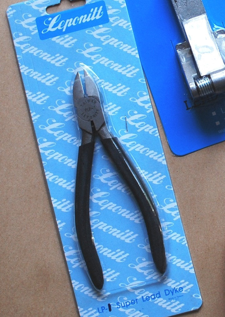 Leponitt Super Lead Dykes for nipping/ cutting lead came. The pliers are spring loaded with insulated handles for a good grip. - GlassSupplies41.com